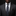 Man wearing a gray suit with a blue plaid tie against a black background