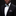 Man wearing a black suit with a colorful bow tie and pocket square against a dark background
