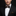 Black with gold dots bow tie and square on man with suit