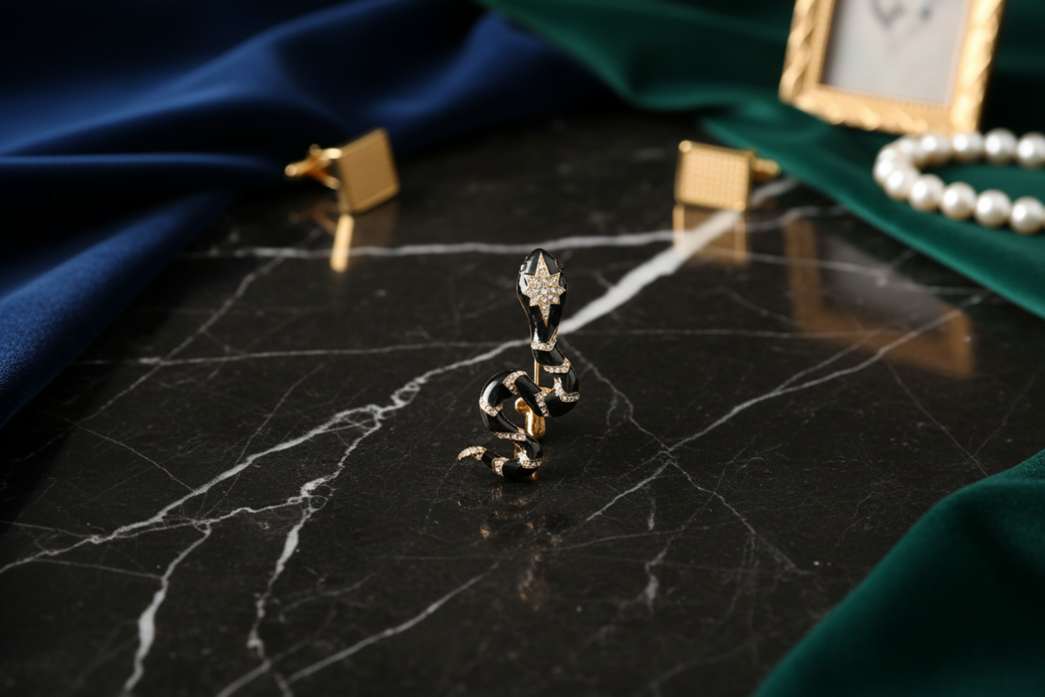 a black snake brooch