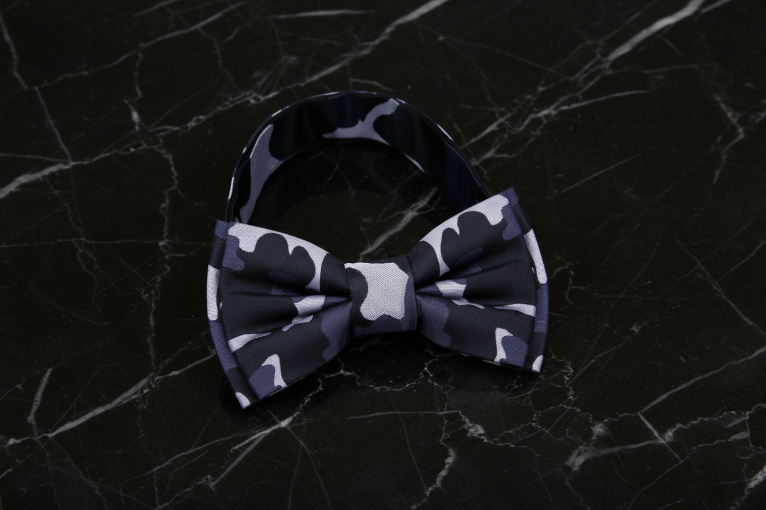 A Black, Grey Camo Fleck Pattern Pre Tied