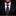 Man wearing a black suit with a patterned tie and pocket square on a dark background