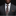 Man wearing a dark gray suit with a patterned tie and pocket square on a black background