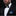 Man wearing black paint splash bow tie and square