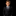 Young boy in a black suit with a white shirt and black tie on a black background