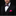 Man wearing a black suit with a pink bow tie and pocket square on a dark background