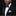 Man wearing a black suit with a colorful bow tie and pocket square on a black background