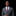 Man wearing blue red and black abstract necktie and grey suit