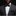 Man wearing a gray suit with a patterned bow tie and pocket square against a black background