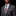 Man wearing a gray suit with a red and black checkered tie and pocket square on a black background