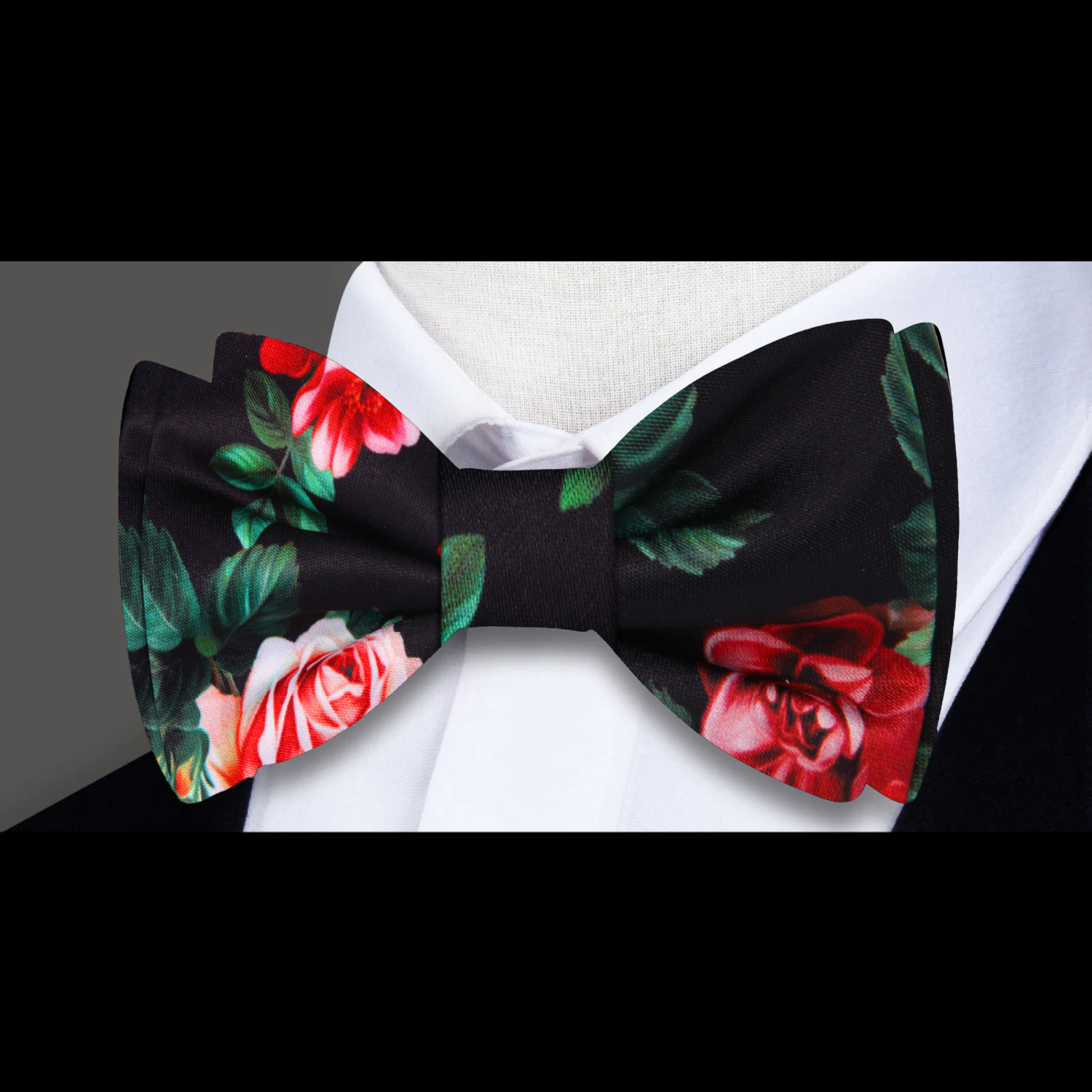 A Black Background with Red Roses and Green Petals Silk Self Tie Bow Tie