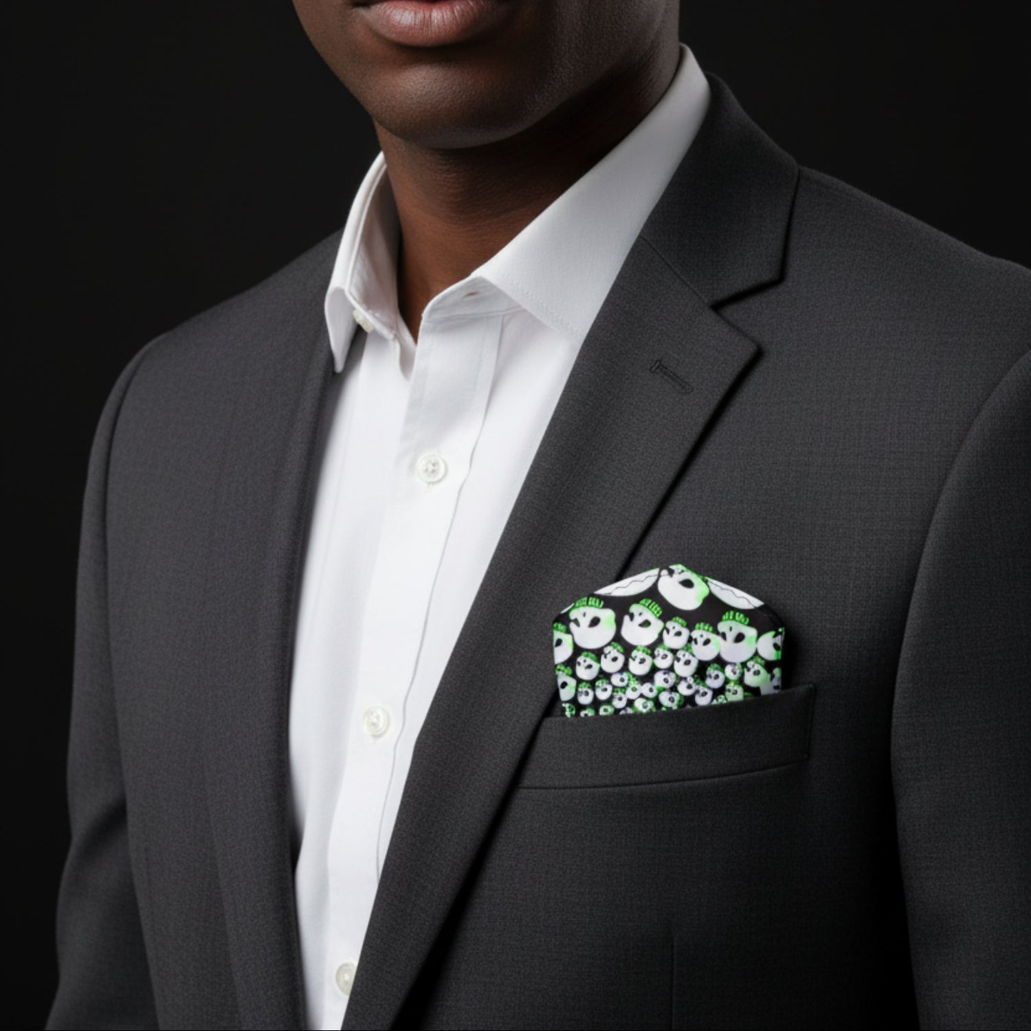 Man wearing black and green with white skulls square