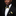 Man wearing a black suit with a yellow bow tie and pocket square on a dark background