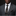 Man wearing a gray suit with a patterned tie and pocket square on a black background