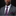 Man wearing black with pink stripes and white dots tie and square on suit