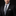 Man wearing a black suit with a gray tie and pocket square on a dark background