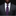 Man wearing a gray suit with a purple tie and pocket square on a black background
