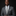 Man wearing a gray suit with a striped tie on a black background