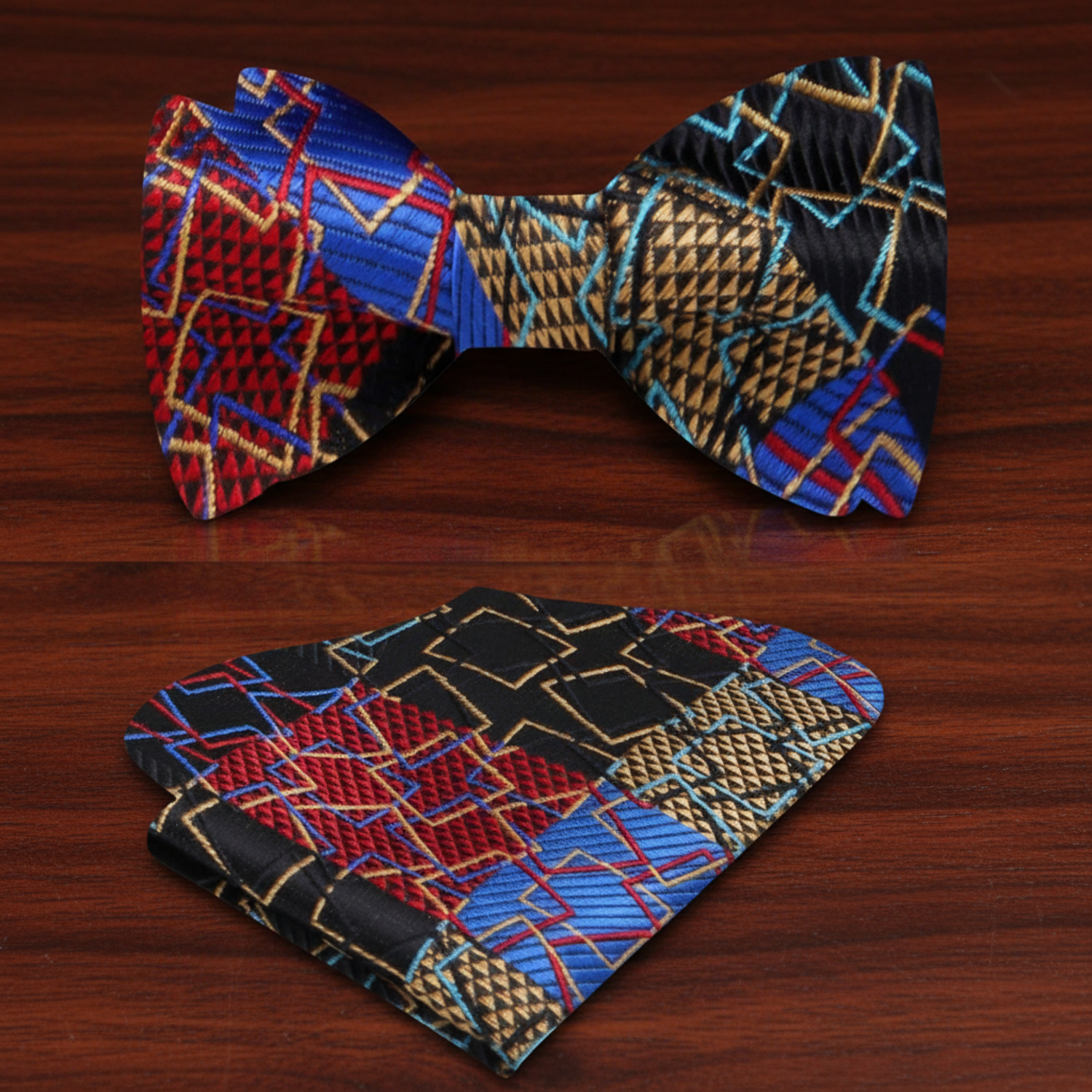 A Black, Gold and Red Geometric Bow Tie and Pocket Square
