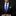 Man wearing a black suit with a blue tie and pocket square on a dark background