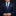 Child wearing a navy suit with a patterned tie and pocket square on a black background
