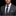 Man wearing a gray suit with a blue and gray striped tie and pocket square on a black background