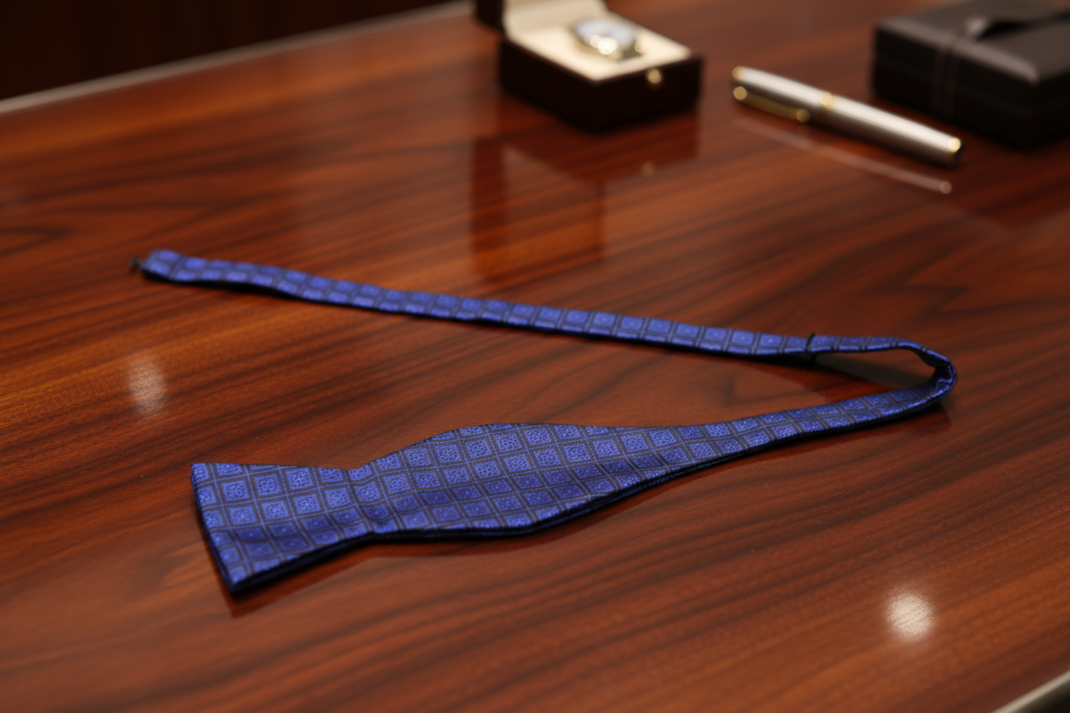 A Dark Blue, Blue Geometric Squares With Small Flowers Self Tie Bow Tie
