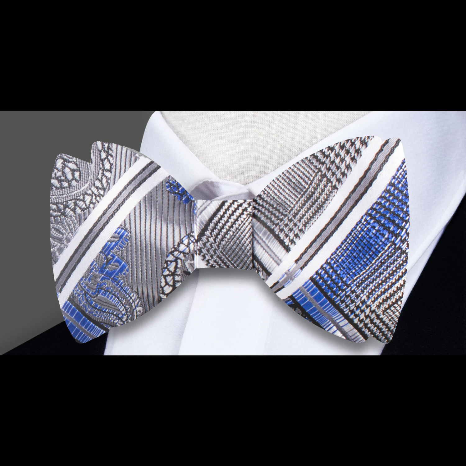 A Silver, Black, Blue Geometric and Paisley Pattern Self Tie Bow Tie