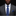 Man wearing a gray suit with a blue tie and pocket square on a black background