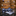 A Dark Blue, White, Yellow Circular Abstract Pattern Self Tie Bow Tie With Accenting Pocket Square
