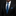 Man wearing a black suit with a blue patterned tie and pocket square on a dark background