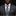 Man wearing a gray suit with a patterned tie and pocket square on a black background