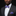 Man wearing a black suit with a colorful bow tie and pocket square on a black background