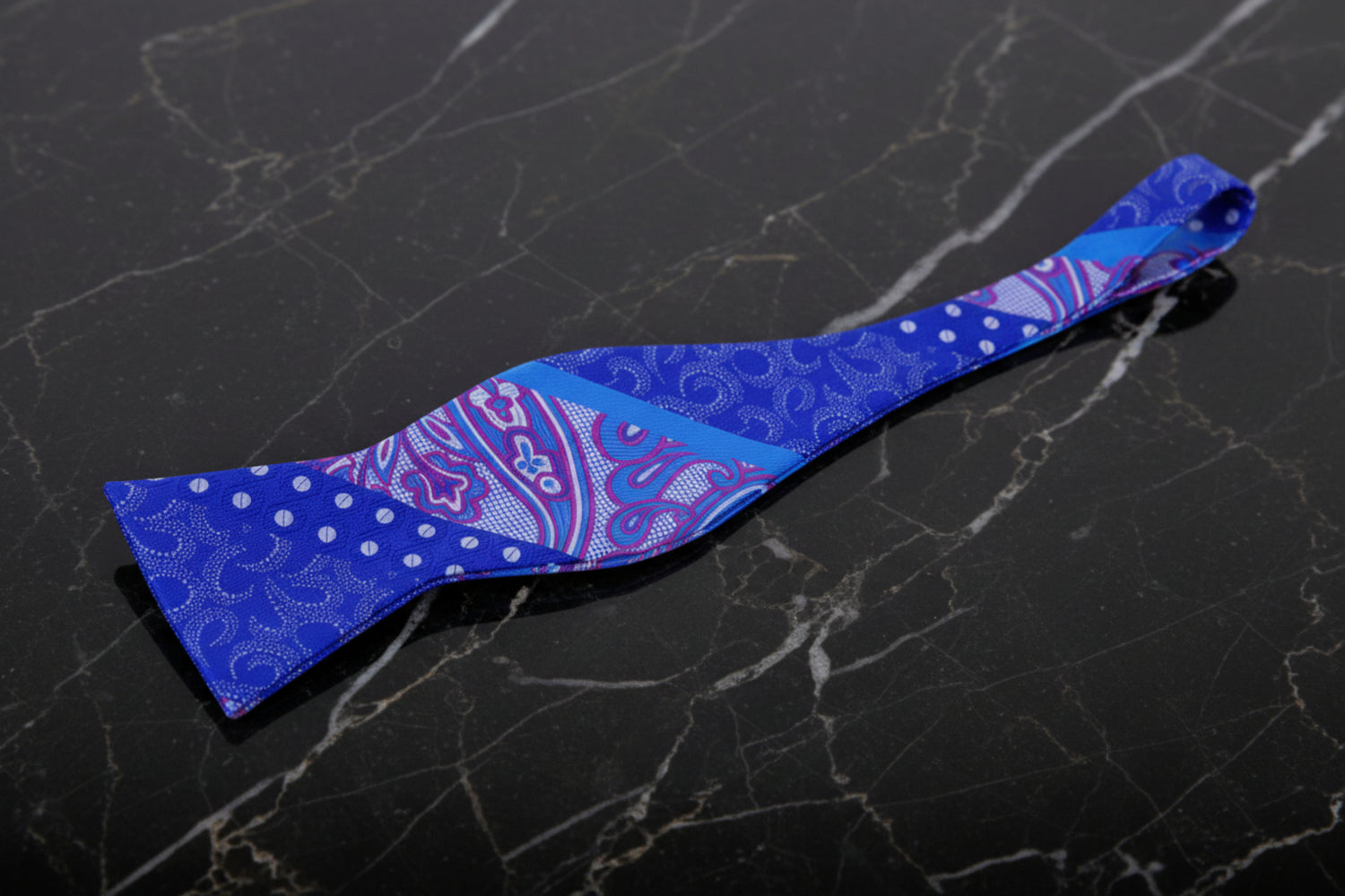 A Blue, Purple Abstract and Paisley Pattern Self Tie Bow Tie