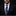 Man wearing a black suit with a blue patterned tie and pocket square on a dark background