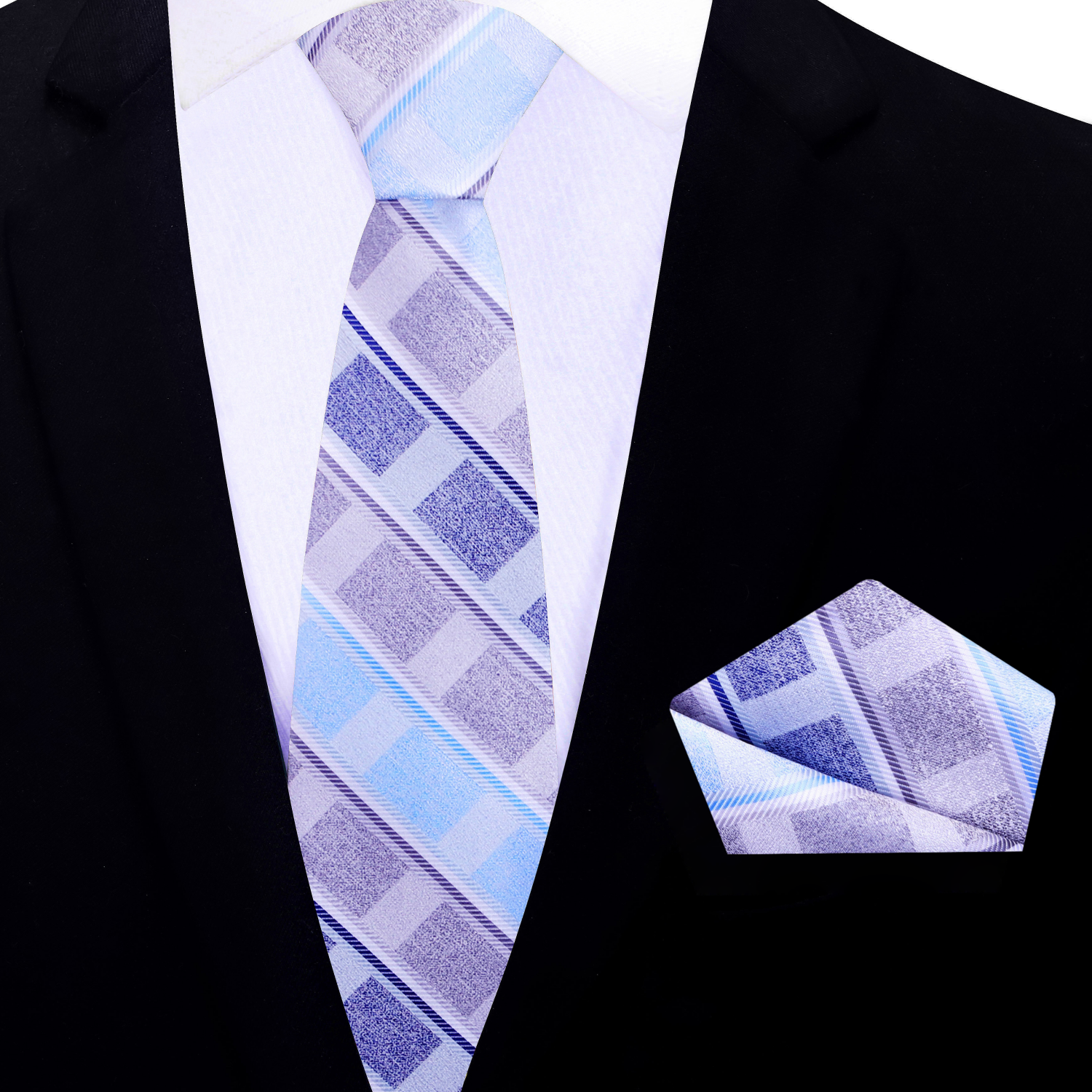 Blue plaid thin tie and matching pocket square on a black suit jacket.