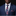 Man wearing a navy suit with a patterned tie and pocket square on a black background