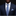 Man wearing a navy suit with a blue patterned tie and pocket square on a black background