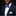 Man wearing a navy suit with a white shirt and blue bow tie on a black background