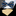 A dark blue bow tie with a golden beer stein pattern displayed on a table.
