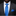 Man wearing a gray suit with a blue striped tie and matching pocket square on a black background