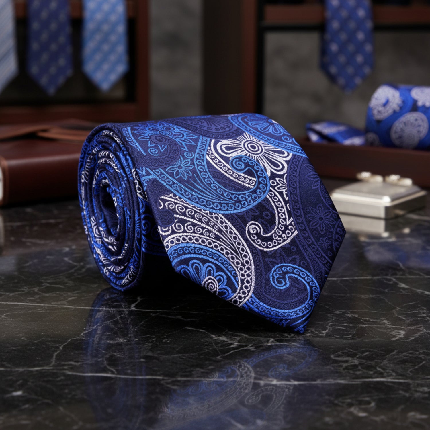 A child's necktie in deep blue and white paisley pattern