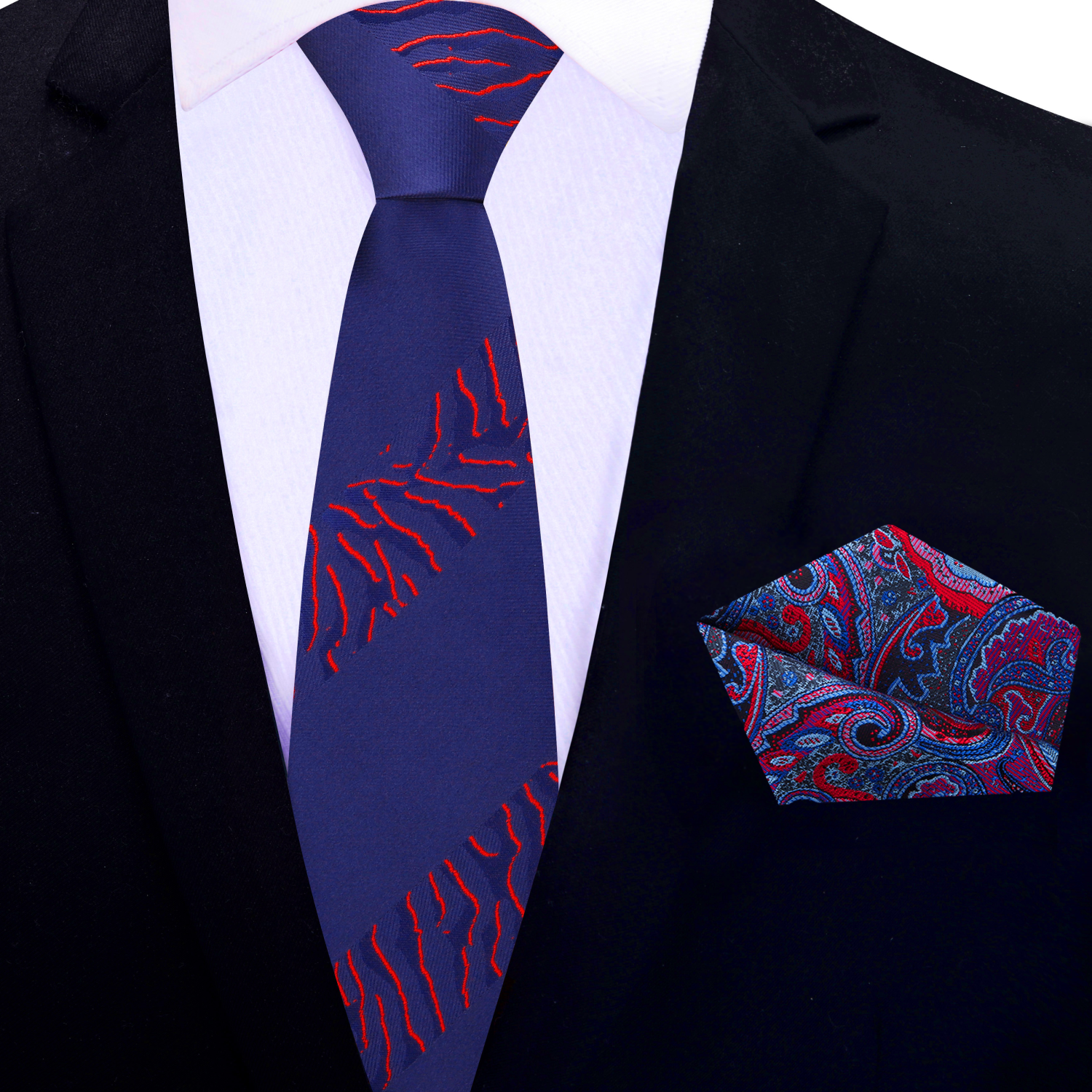 A dark blue necktie with a red tiger print pattern, displayed on a wooden surface with a floral background.