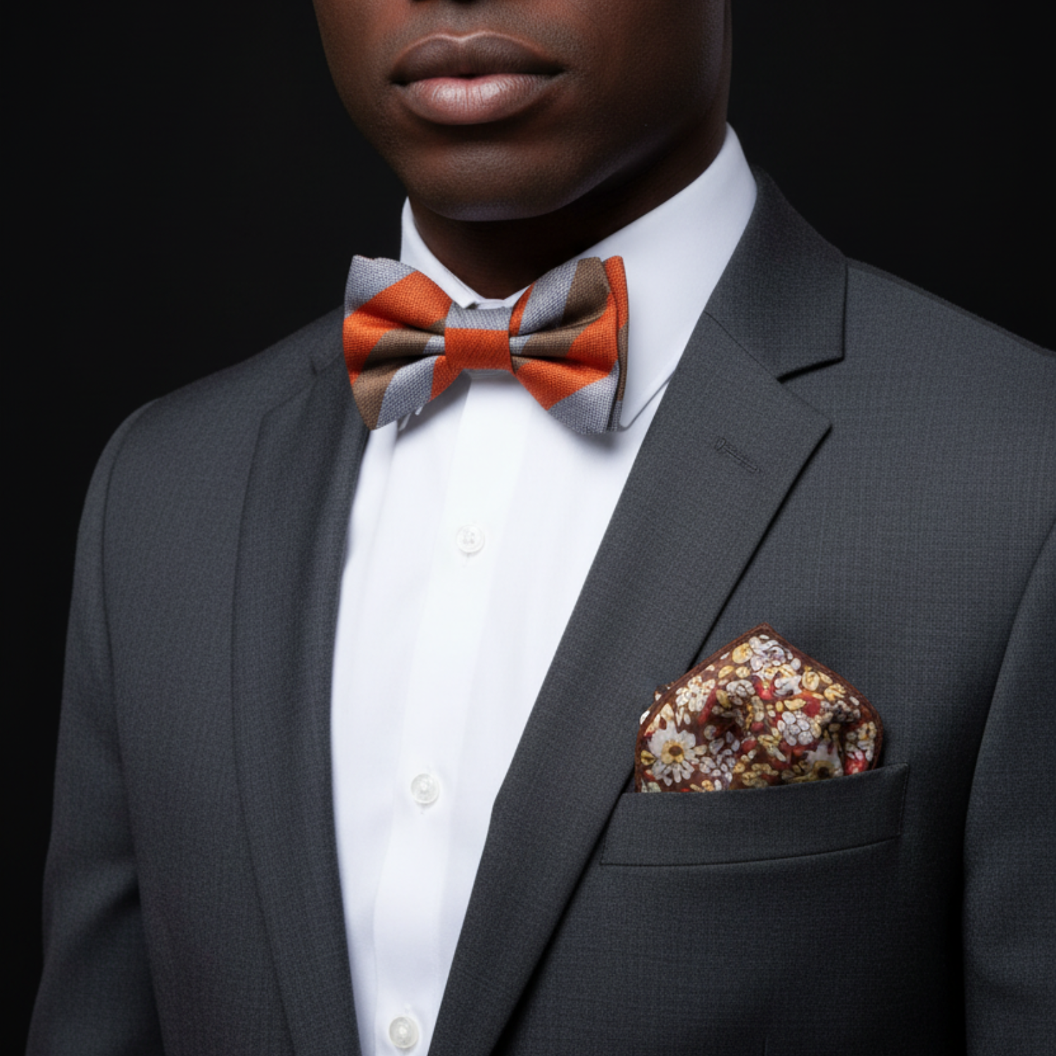 Brown Grey Red Mecca Stripe Bow Tie and Accenting Square on Man Wearing Suit