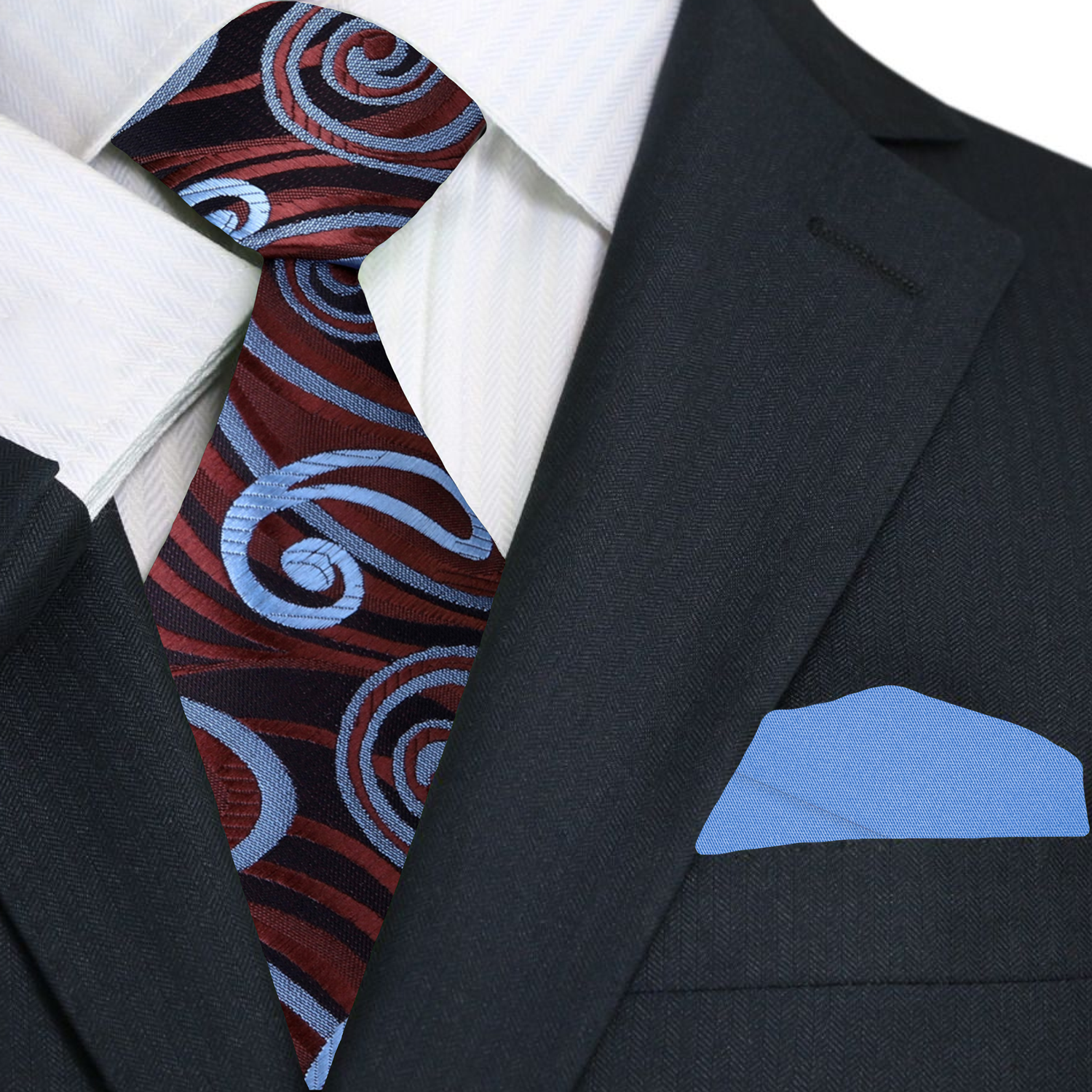 Close-up of a suit with a A Brown, Dark Brown And Light Blue Paisley Pattern Necktie, Light Blue Pocket Square.