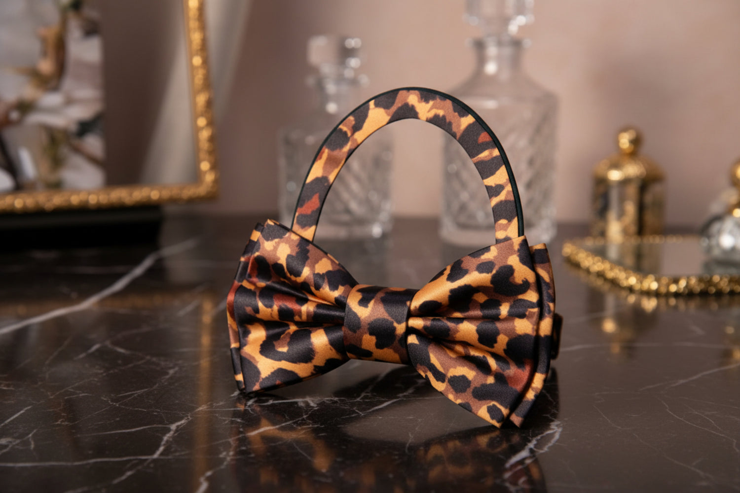 Leopard print pre tied bow tie on a white background