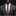 Man wearing brown and orange plaid tie and accenting brown square 