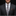 Man wearing a gray suit with a patterned tie and pocket square on a black background
