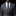 Man wearing a gray suit with a patterned tie on a black background
