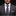 Man wearing a gray suit with a colorful floral tie against a black background